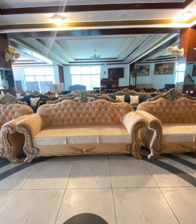 "6-seater royal sofa set in golden beige with hand-carved wooden frame and velvet upholstery"